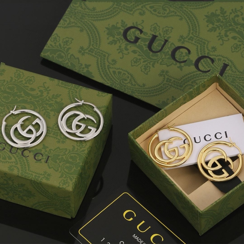 G*u*i earrings